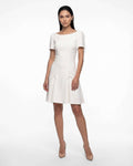 Short white flared dress with sleeves