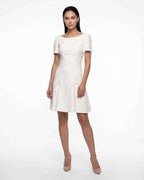 Short white flared dress with sleeves