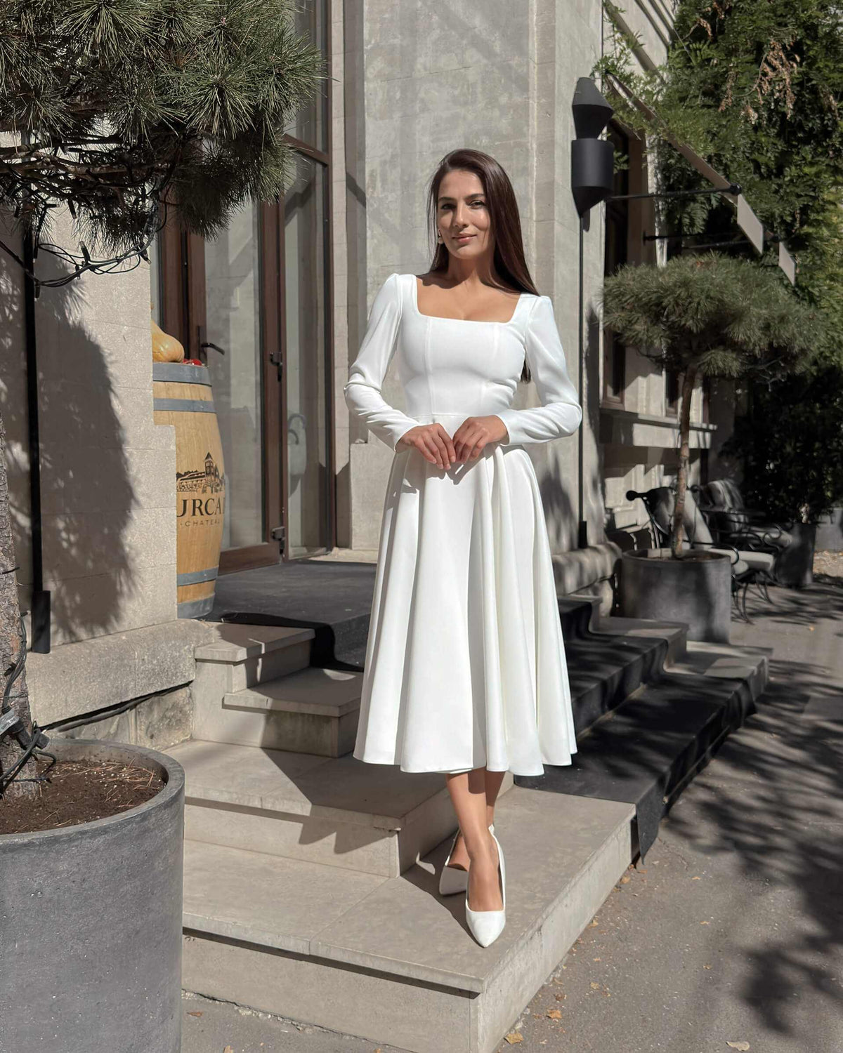 White midi dress with long sleeves made of crepe for civil and religious wedding