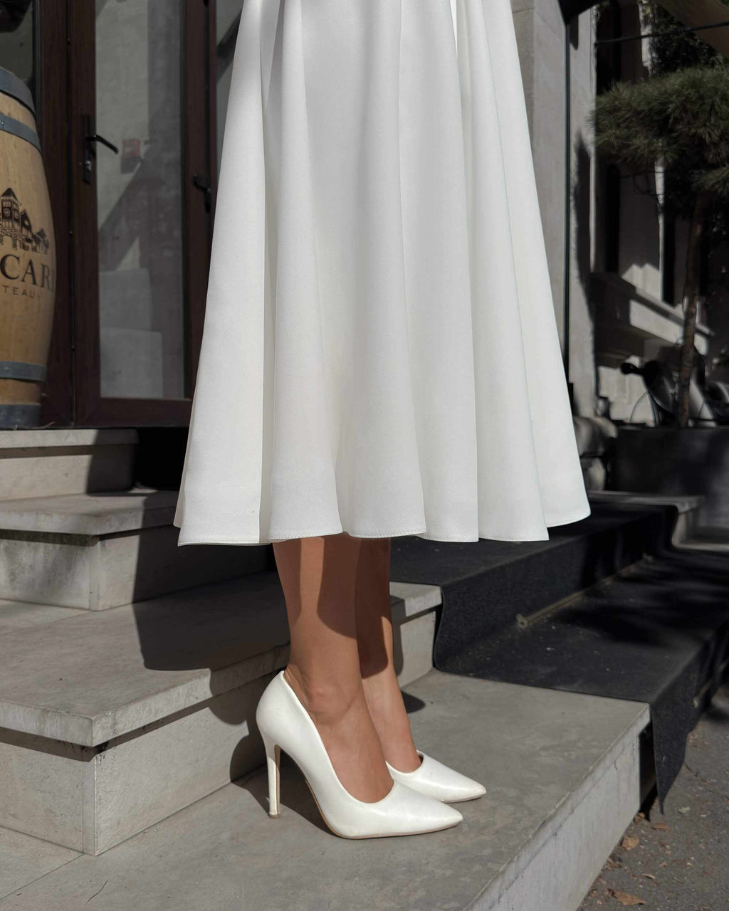 White midi dress with long sleeves made of crepe for civil and religious wedding