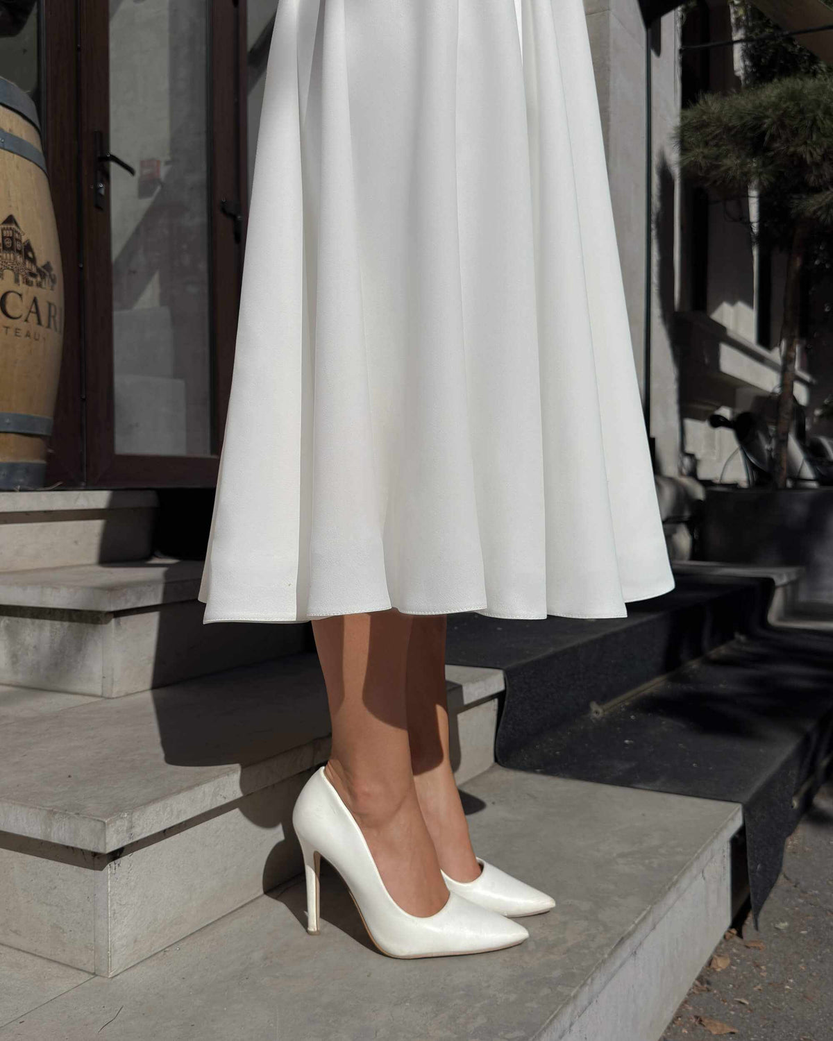 White midi dress with long sleeves made of crepe for civil and religious wedding