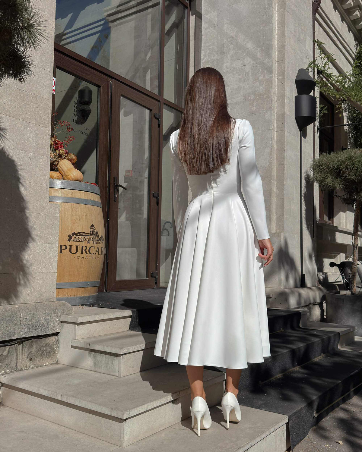 White midi dress with long sleeves made of crepe for civil and religious wedding