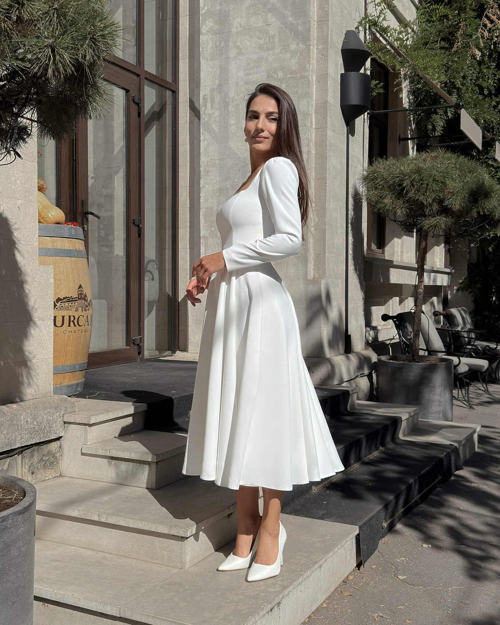 White midi dress with long sleeves made of crepe for civil and religious wedding